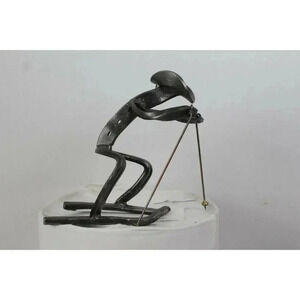 Hand made metal cowboy skiing Art 8inch tall